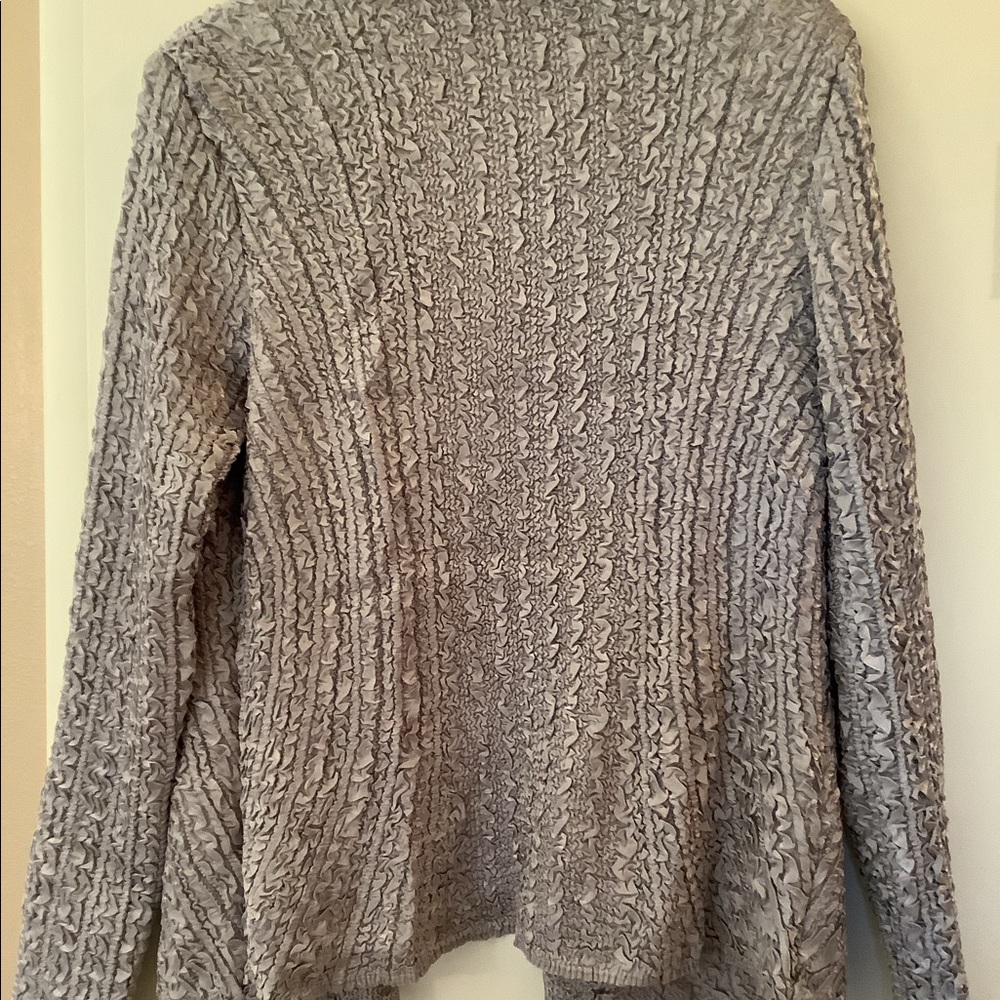 Blouse and jacket combo, dressy for party.